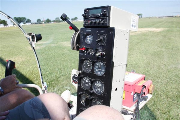 This is a trip in a "MASH" helicopter around Oshkosh.
Alas the first picture is the last - look at the name/s.
I'm not going to put descriptions on al