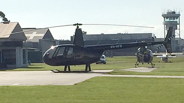 Robinson R44 II VH-HFN YMMB 20200611.JPG