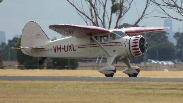 Stinson Reliant takeoff VH-UXL YMPC.JPG