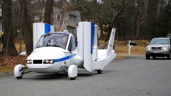 Terrafugia-Transition-driving.thumb.jpg.20720bc4ae7eceb361fdd9ba23df50ed.jpg